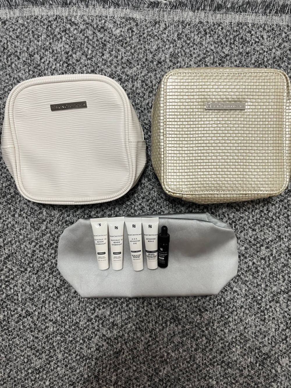 SkinCeuticals White and Gold Skincare Gift Set with Gray Pouch
